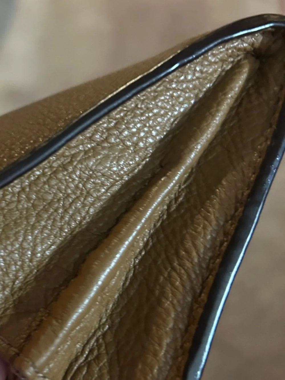 Coach compact pebbled